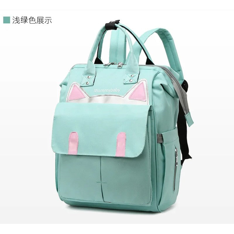Sac à dos à langer vert d'eau avec motif oreilles de chat sur la poche avant - Bébé Lova