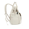 Sac à langer beige vu de côté avec port USB et poche latérale - Bébé Lova