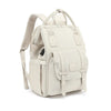 Sac à langer beige vu de trois quarts avec poche avant à rabat et port USB - Bébé Lova