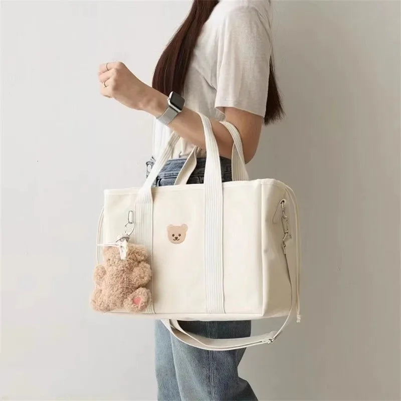 Sac à langer compact NappyPack avec porte-clés peluche ourson - Bébé Lova
