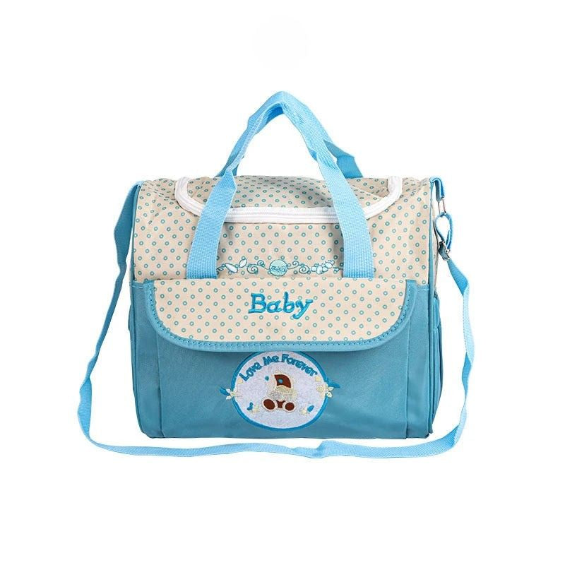 Sac à langer BearBag bleu ciel vue de face avec motif ourson cartoon - Bébé Lova
