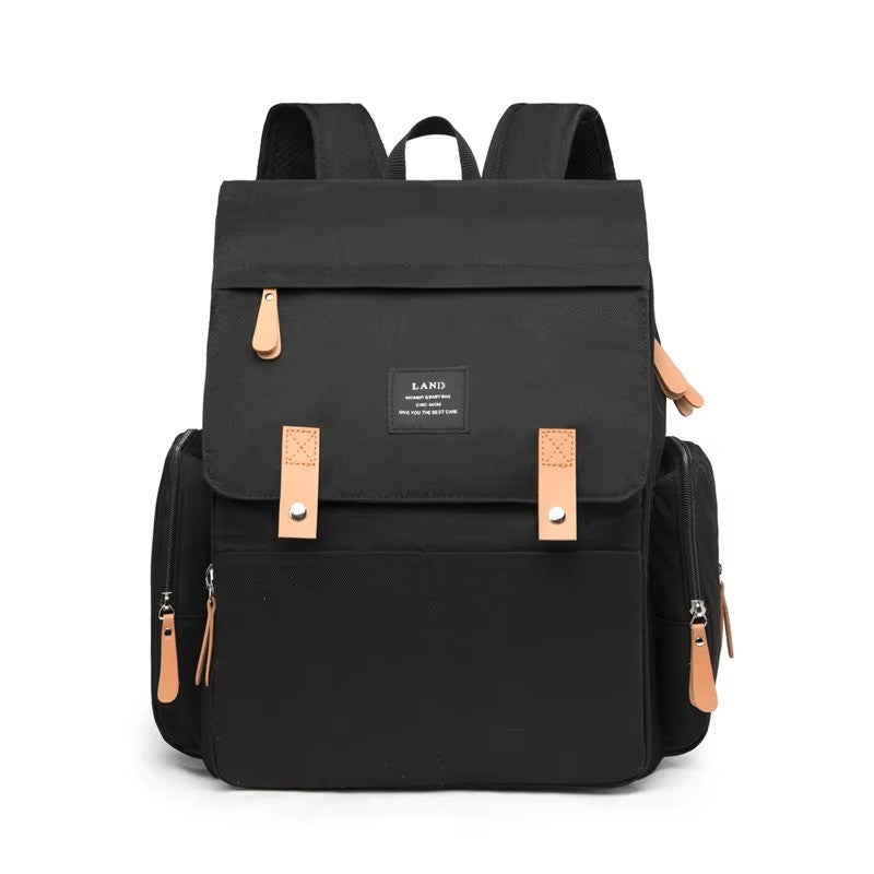 Sac à langer Oxford maman coloris noir avec finitions cuir et fermeture à boutons - Bébé Lova