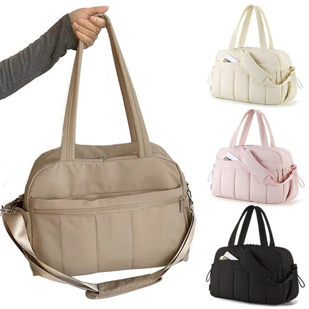 Sac à langer sport porté par les poignées, présenté dans ses différents coloris - Bébé Lova