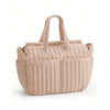 Sac à langer matelassé beige avec poches extérieures multiples vue de face - Bébé Lova