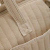 Détail des coutures renforcées et de la texture douce du tissu gaufré - Bébé Lova