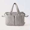 Sac à langer matelassé gris perle avec anses renforcées et poches latérales - Bébé Lova
