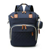 Sac à langer à dos coloris bleu marine présenté de face avec mini-pochette - Bébé Lova