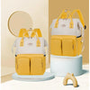 Sac à langer à dos coloris jaune et blanc présenté sous deux angles - Bébé Lova