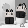 Sac à langer à dos coloris noir et blanc présenté sous deux angles - Bébé Lova