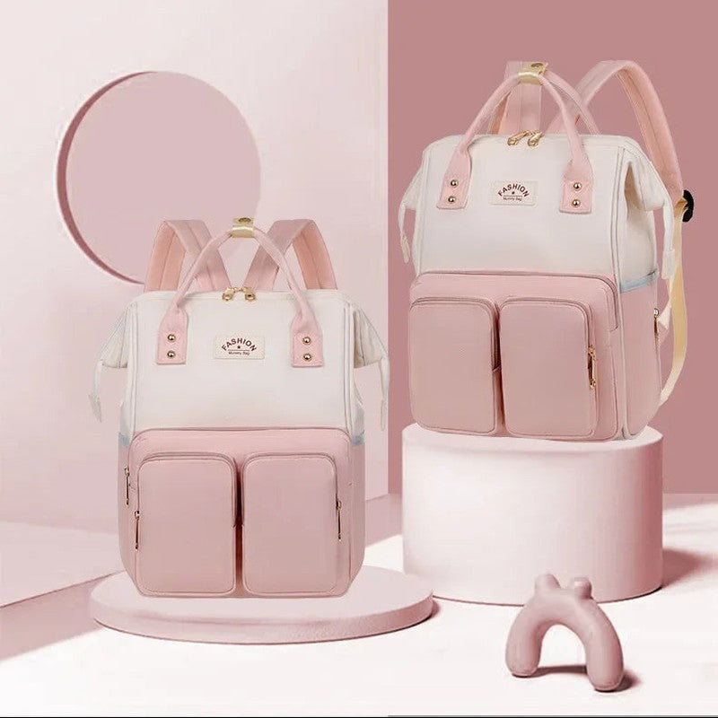 Sac à langer à dos coloris rose et blanc présenté sous deux angles - Bébé Lova