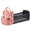 Sac à langer de voyage rose avec station à langer dépliée - Bébé Lova