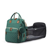 Sac à langer de voyage vert avec station à langer dépliée - Bébé Lova