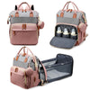 Sac à langer rose et gris présenté de face, ouvert sur ses poches biberons et déplié en station à langer - Bébé Lova