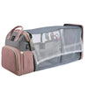 Sac à langer FoldNest déplié en lit de voyage portable avec moustiquaire intégrée - Bébé Lova