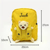 Sac à dos maternelle jaune avec dimensions indiquées : 27 cm de hauteur, 20 cm de largeur et 10 cm de profondeur - Bébé Lova