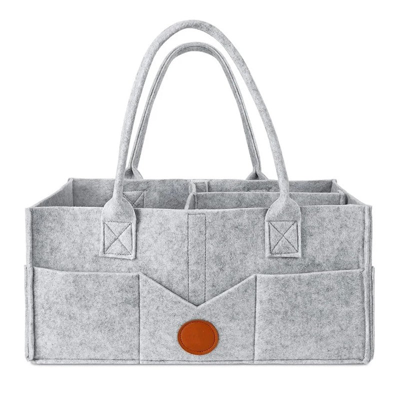 Sac de rangement à couches en feutre gris avec anses et compartiments, vue de face - Bébé Lova