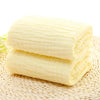Serviette de bain bébé jaune pâle pliée en coton mousseline - Bébé Lova