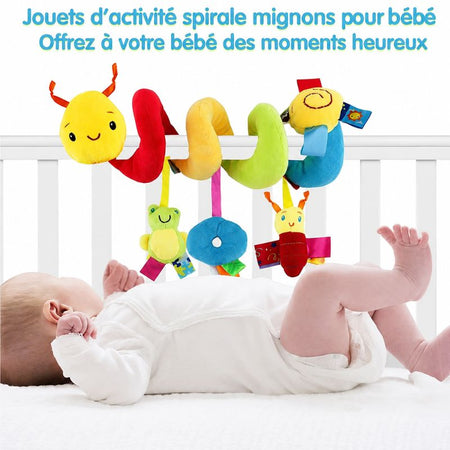 Spirale d’éveil bébé colorée accrochée à un lit à barreaux avec bébé allongé - Bébé Lova