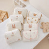 Collection de pochettes et trousses assorties au tapis à langer brodées ours et lapin - Bébé Lova