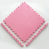 Dalles de tapis puzzle PuzzleMat roses en gros plan avec leurs bords emboîtables et bordures - Bébé Lova
