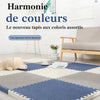 Grand tapis puzzle EVA bleu et gris installé dans un salon pour créer un espace confortable - Bébé Lova