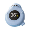 Thermomètre de bain bébé en forme de phoque bleu vu de face affichant 36°C - Bébé Lova