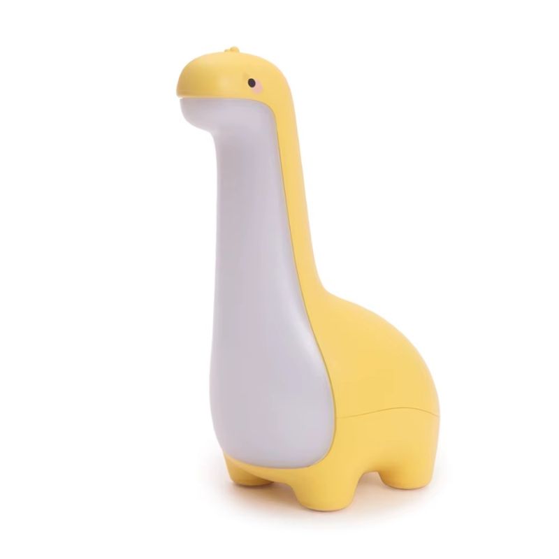 Veilleuse bébé en forme de dinosaure jaune sur fond blanc - Bébé Lova